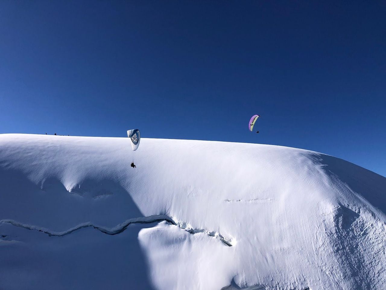Ski & Fly in Verbier: Tandem-Gleitschirmflug mit Skiern