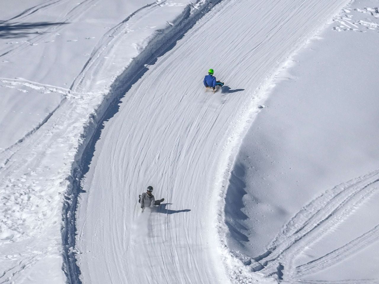 Evening sledding at Rinerhorn incl. a single ticket and fondue.