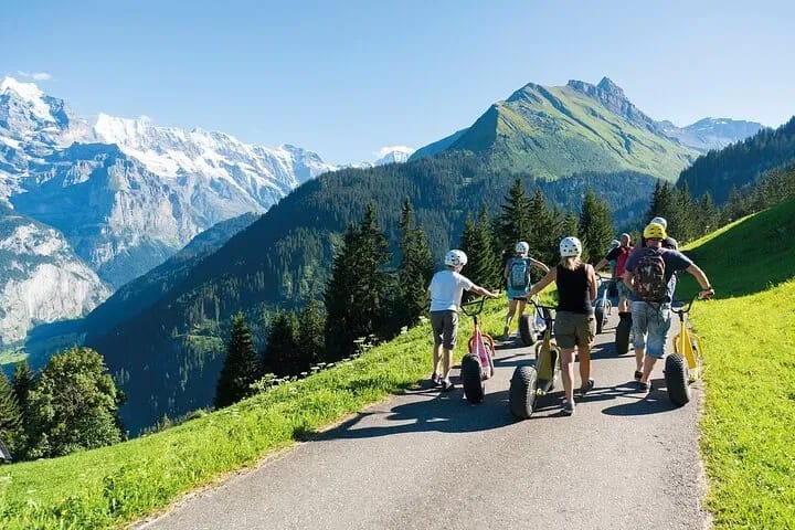 From Zurich: Private Day Trip with Monster Scooter Tour and Fondue