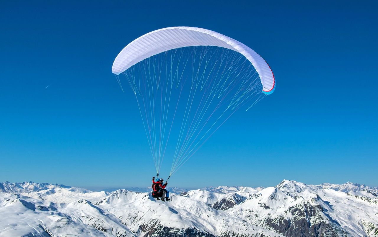 Davos Gleitschirmfliegen zu zweit mit Fondue