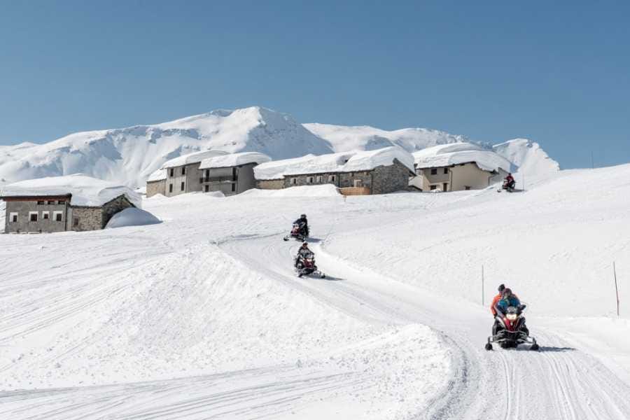 Ganztägige Schneemobil Tour Privat inkl. Mittagessen ab Madesimo Italien