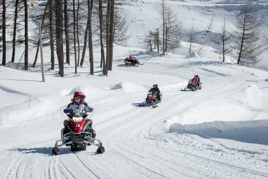 Luxus Schneemobil Tour inkl. Mittagessen ab Madesimo Italien