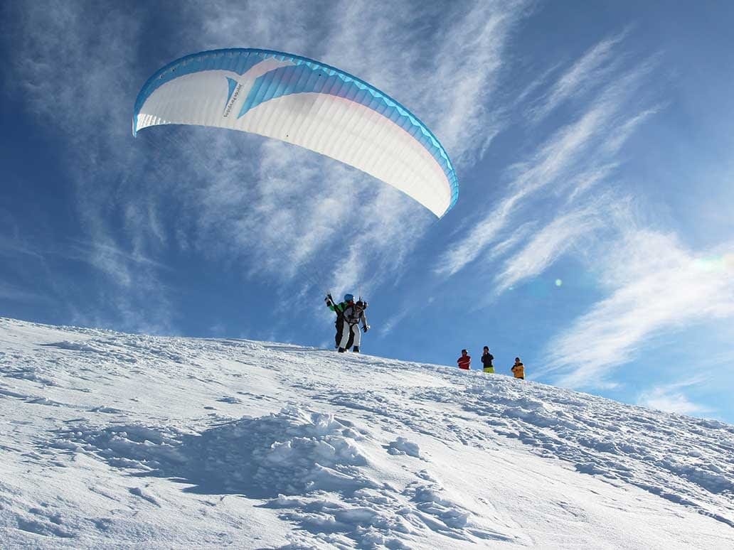 Davos Gleitschirmfliegen zu zweit mit Fondue
