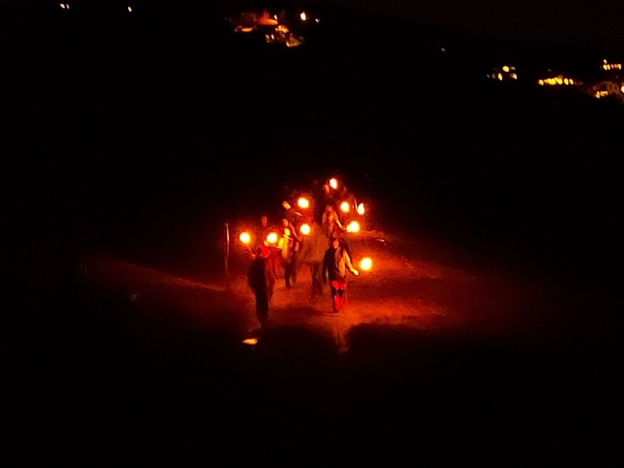 Torchlight walk with aperitif and music in Vella