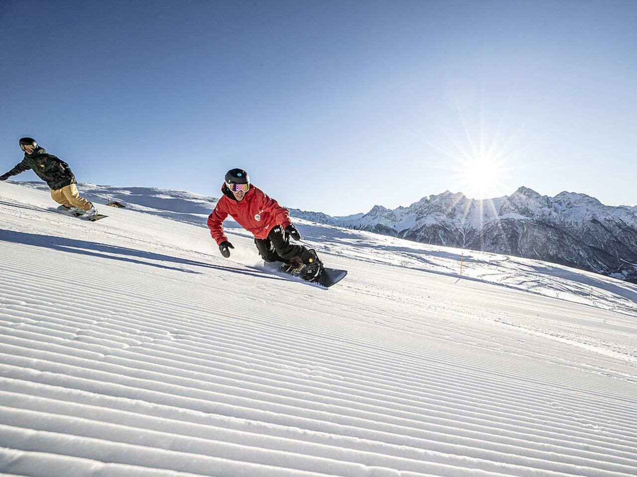 Snowboard lessons for children and adults in Scuol