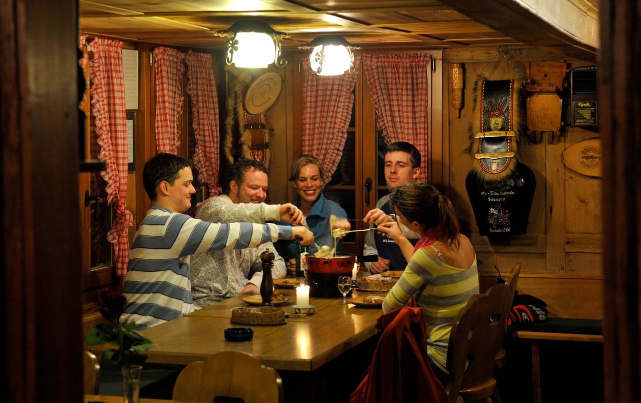 Serata in capanna con fondue di formaggio e fiaccolata a Engelberg