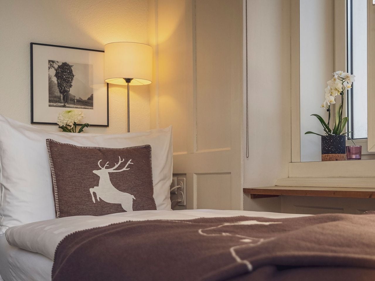 Skitageskarte mit Übernachtung im Hotel National Davos