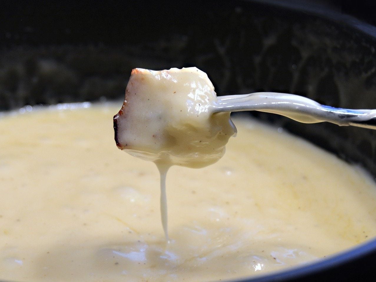 Davos Gleitschirmfliegen zu zweit mit Fondue