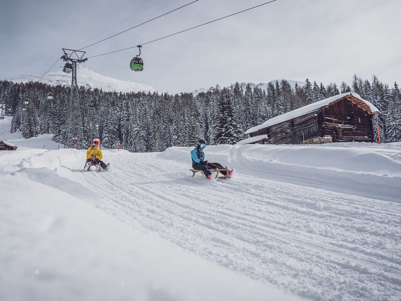 Einzelticket Abendschlitteln am Rinerhorn inkl. Fondue und Schlittenmiete
